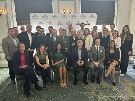 Board of Directors surrounded by Connecting Future Leaders and other members in London in June